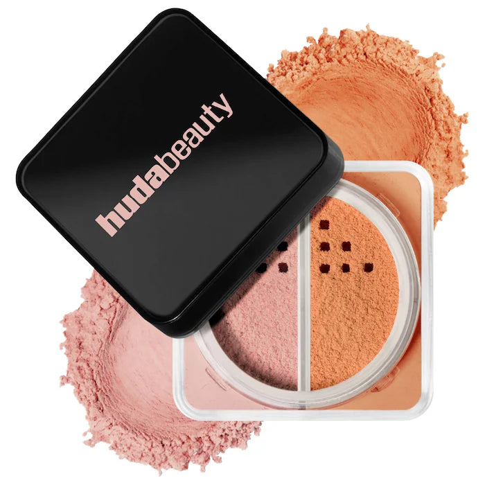 Huda beauty makeup product with open case showing pink and orange powders on a white background