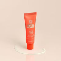 Red tube of Tetra Force on a beige background