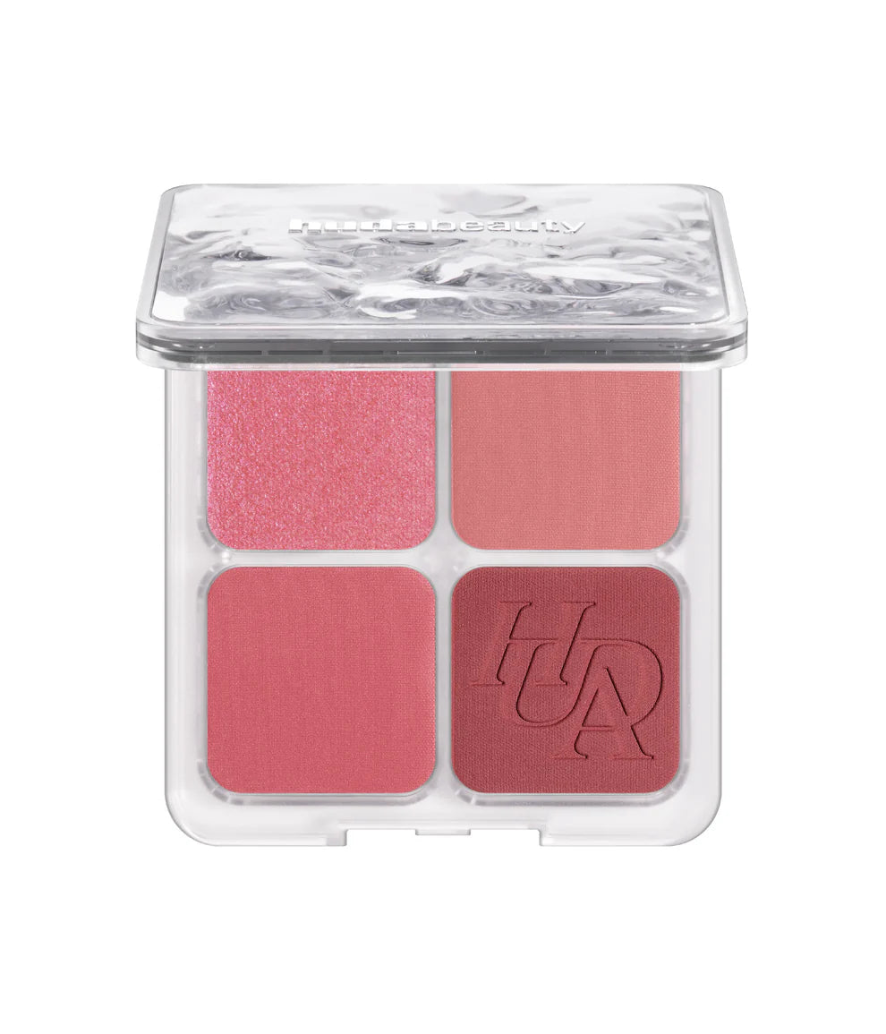 Makeup palette with four pink shades in a clear case 