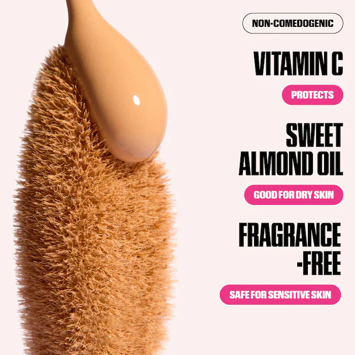 Product with a spoonful of cream on a textured surface, featuring text about product benefits.