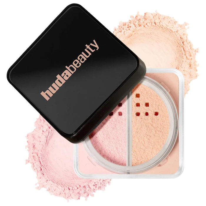 Huda beauty  loose two tone powder with open case showing pink powder  and nude powder. Translucent.