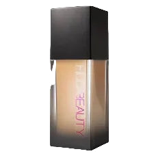 Beauty product with 'Full Beauty' text on a black and beige container