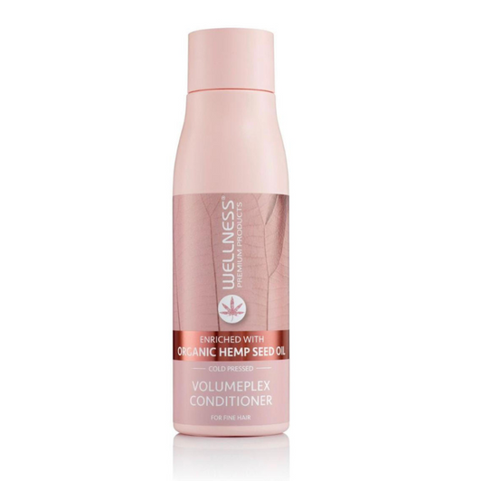 Wellness Volumeflex Conditioner bottle on a white background
