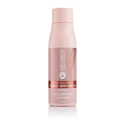 Wellness Volumeplex shampoo bottle on a white background